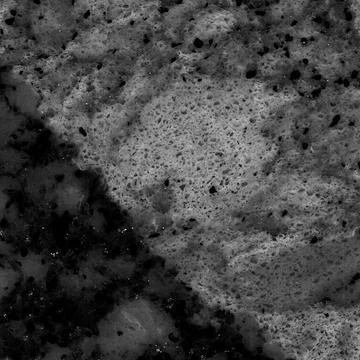 Granite stone pattern useful as background or texture, natural black white gray Stock Photos