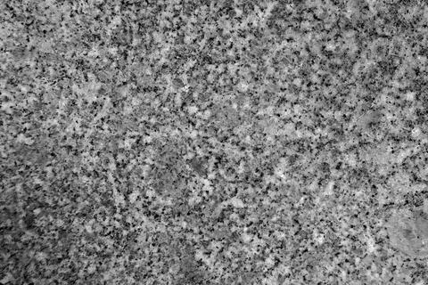 Granite stone pattern useful as background or texture, natural black white gray Stock Photos