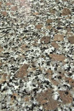 Granite stone pattern useful as background or texture, natural black white be Stock Photos