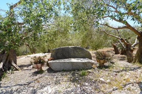 Granite stone in the shape of a bench. 스톡 사진