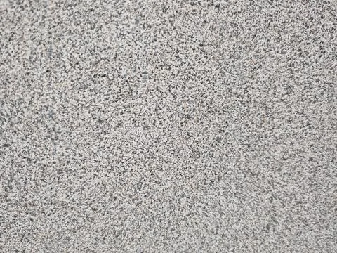 Granite stone texture background with natural speckled mineral detail Stock-Fotos