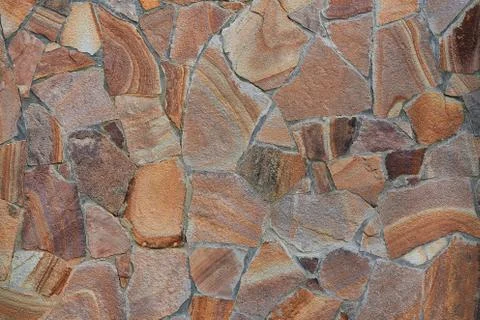 Granite stone tile cobblestone wall Stock Photos