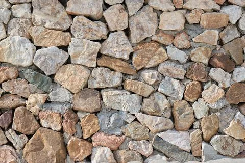 Granite stone wall, pattern of natural gray granite stone wall for background Foto stock
