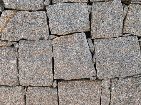 Granite stone wall texture Stock Photos