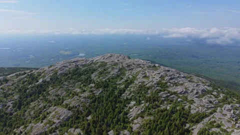 Granite summit of Mount Monadnock above forested New Hampshire landscape Stock Footage 346490175