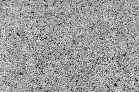 Granite surface close up. Granite stone texture background. Detail of grani.. Stock Photos