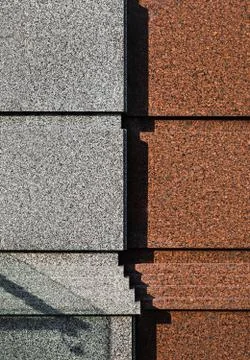 Granite wall of building Stock Photos