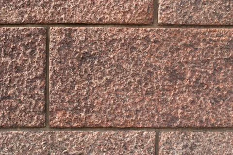 Granite wall closeup texture background. Stock Photos