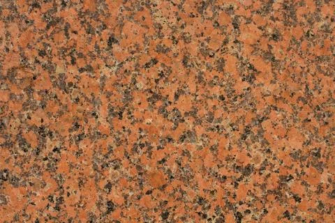 Granite.Granite texture background.Red granite textures. Stock Photos