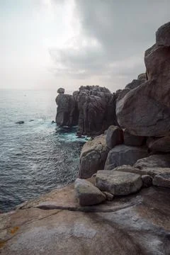 Granitic cliffs of Punta Moras shaped by the waters of the Cantabrian Sea Photos