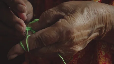 Granny knitting close up shot Stock Footage 88477520