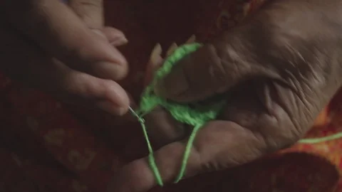 Granny knitting close up shot Stock Footage 88477873