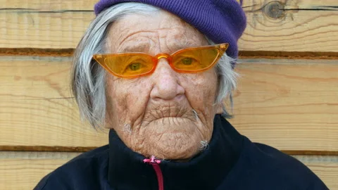 Granny looks at camera. Stock Footage 122371226