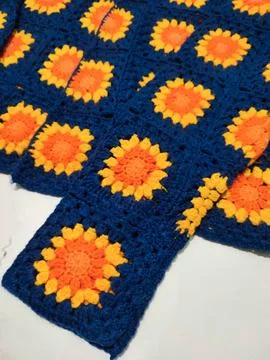 Granny square crocheting, crochet pattern, sunflower cardigan Stock Photos