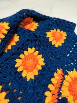 Granny square crocheting, crochet pattern, sunflower cardigan Stock Photos