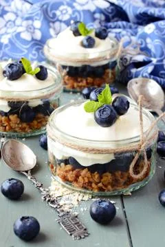 Granola desserts with blueberries Stock Photos