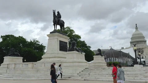 Grant Memorial and U.S. Capitol with people walking by Stock Footage 320744327