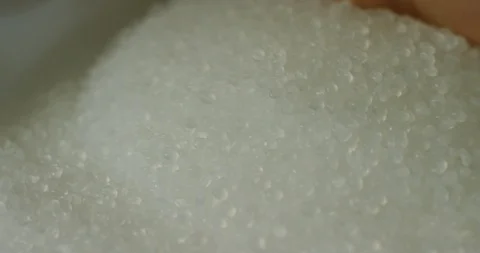 Granular plastic in the bag, slow motion Video stock 123276695