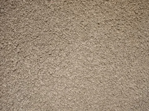 Granular surface of the cement beige Stock Photos