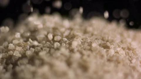 Granulated brown sugar falling in slow motion Stock Footage 71211889