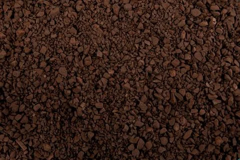 Granulated coffee texture. Coffee background. Wallpaper for design. Stock Photos