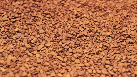 Granulated instant coffee slowly rotating, macro closeup Stock Footage 132643223
