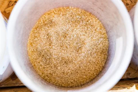 Granulated sugar in container sphere Stock Photos