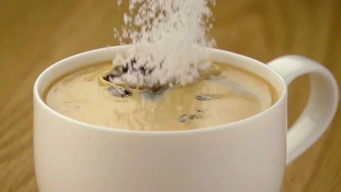 Granulated Sugar Falling into the Cup Stock Footage 110703298