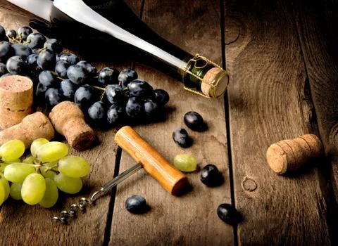 Grape and wine on table Stock Photos