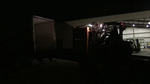 Grape containers loaded into an 18 wheeler at night, 4K. Stock Footage 85411653