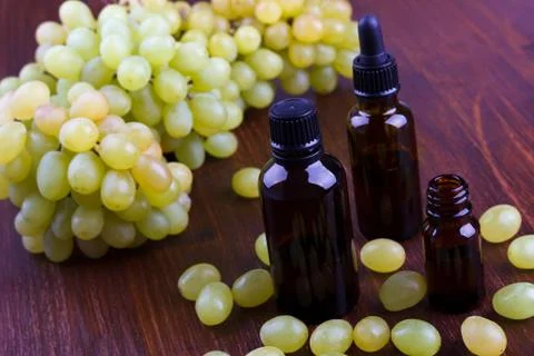 Grape essential oil Stock Photos