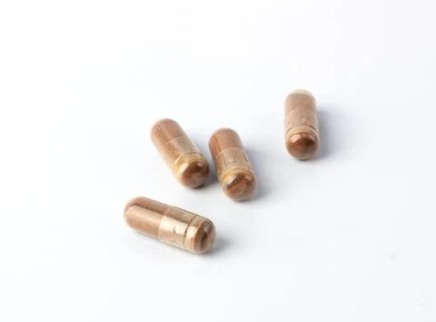 Grape Extract powder capsule on white background Stock Photos