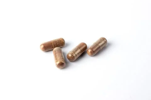 Grape Extract powder capsule on white background Stock Photos