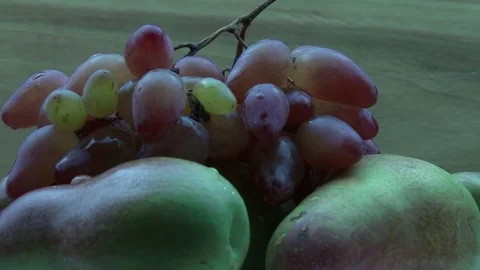 Grape falls on pears Stock Footage 79998721