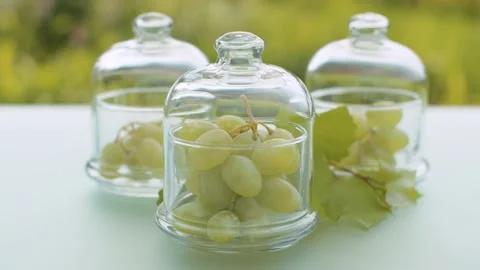 Grape in glass jars Stock Footage 138994951