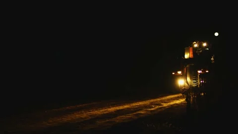 Grape harvester combine machine night time morning dawn dark low light Stock-Footage 163735003