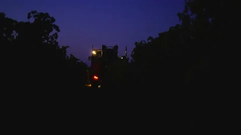 Grape harvester combine machine night time morning dawn dark low light Stock-Footage 163735192