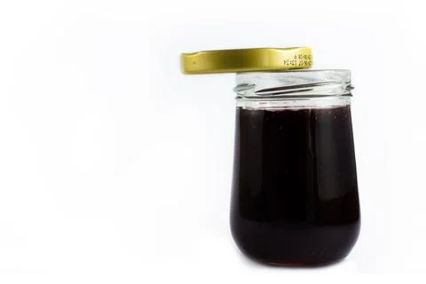 Grape jam isolated on white background. Stock Photos