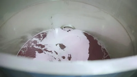 Grape juice being fermented in barrel Stock Footage 87808300