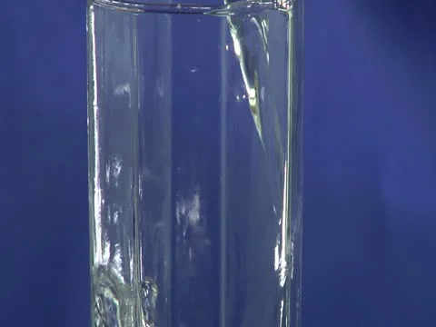 Grape juice flows in glass Stock Footage 22151676