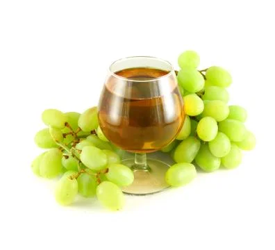 Grape juice with grapes 库存照片