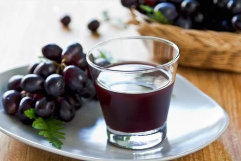 Grape juice Stock Photos