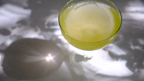Grape martini cocktail includes vodka, white wine, simple syrup and grape jui 動画素材 346506798