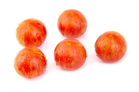 Grape or cherry tomatoes on white background Stock Photos