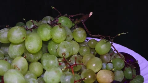 The grape plate on the branch green colors rotates 360 degrees Stock Footage 248612853