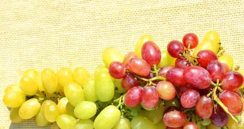 Grape on sacking background Stock Photos