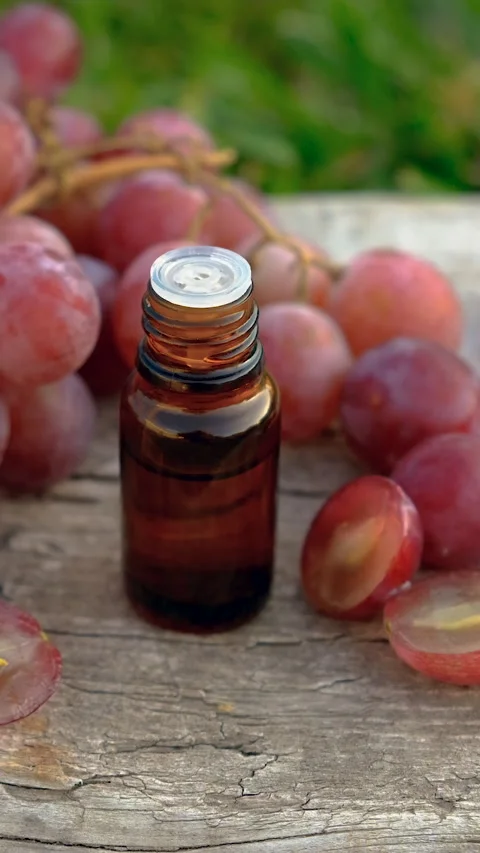 Grape seed extract in the garden. Selective focus. Stock Footage 320825403
