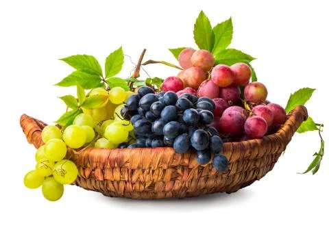 Grape in wicker basket Stock Photos