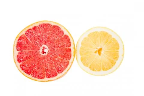 Grapefruit and lemon in a cut on a white background Stock Photos