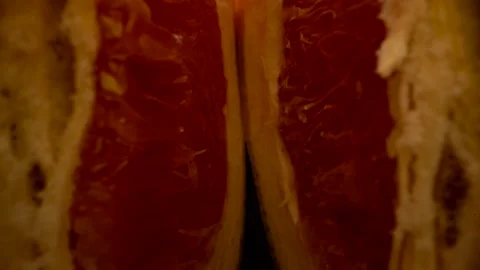 Grapefruit On Black Background camera roll back Stock Footage 131800268